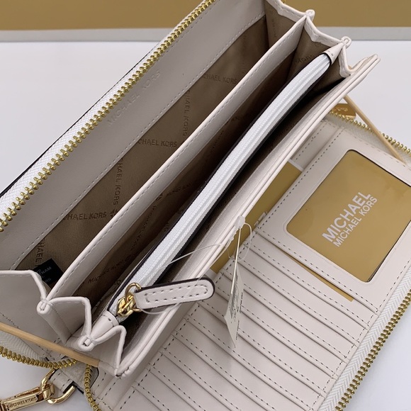 MICHAEL KORS LARGE TRAVEL CONTINENTAL WRISTLET WALLET OPTIC WHITE COLOR - Picture 11 of 16